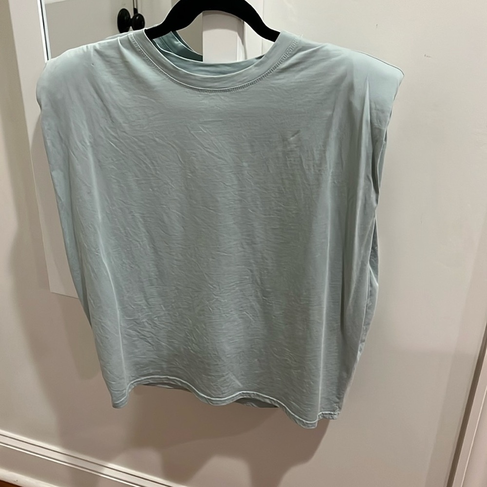 Light blue shoulder padded top! size small